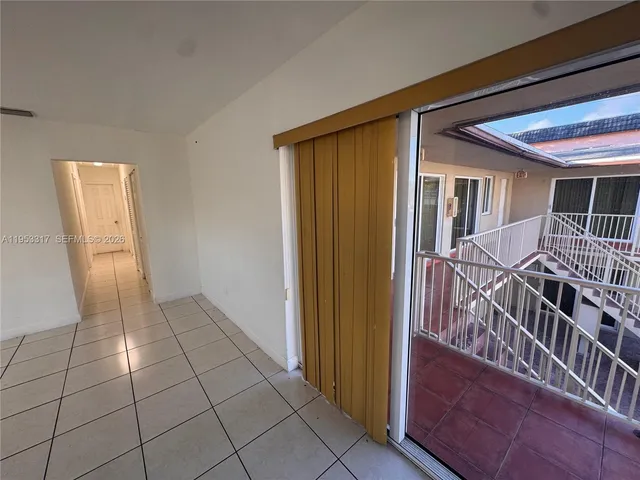 a view of an entryway with a livingroom