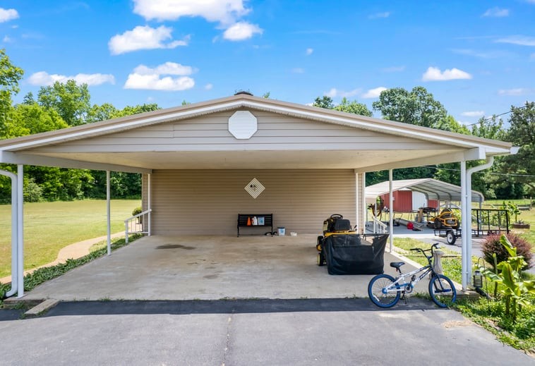6439 Cedar Grove Road Big Sandy, TN 38221 - Photo 27 of 38 a view of a chairs and table in a patio
