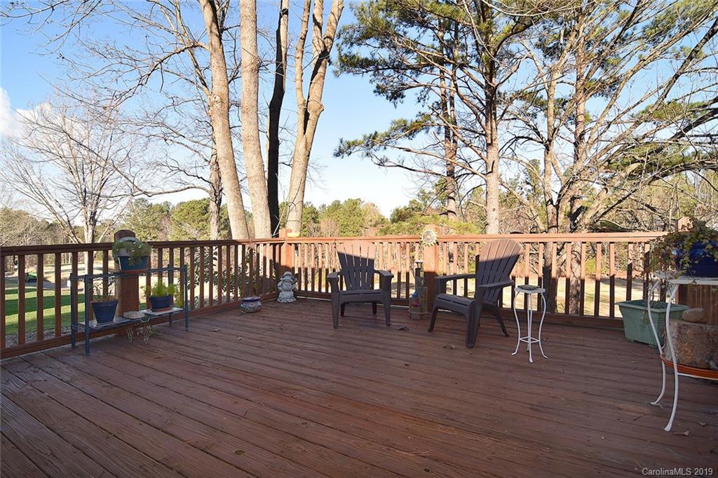 6045 Windjammer Drive Tega Cay, SC 29708 - Photo 25 of 31 a view of a chairs on roof deck