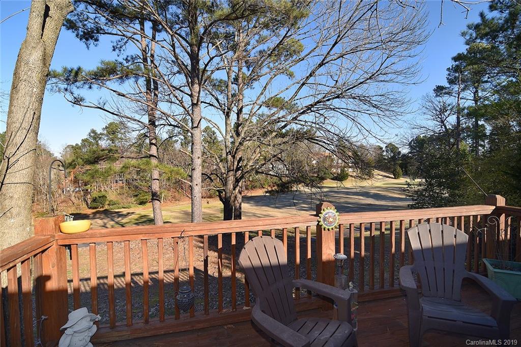 6045 Windjammer Drive Tega Cay, SC 29708 - Photo 26 of 31 a view of a balcony with wooden floor