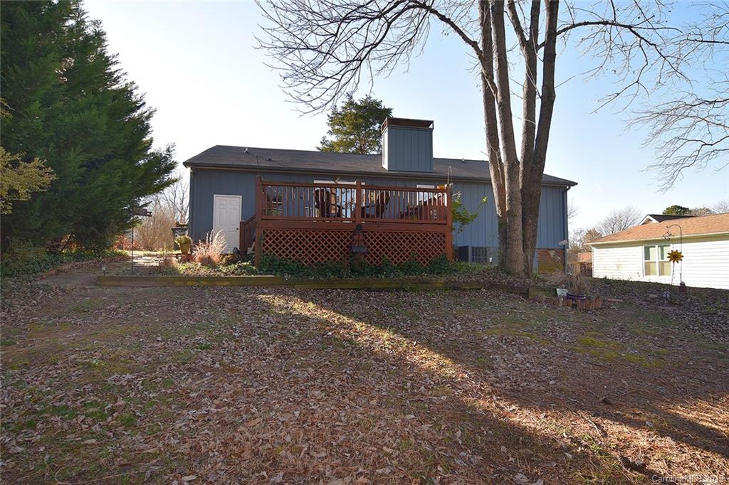 6045 Windjammer Drive Tega Cay, SC 29708 - Photo 27 of 31 a view of a house with large trees