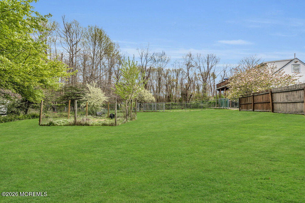 34 State Route Colts Neck, NJ 07722 - Photo 35 of 40 a view of a field of grass and trees
