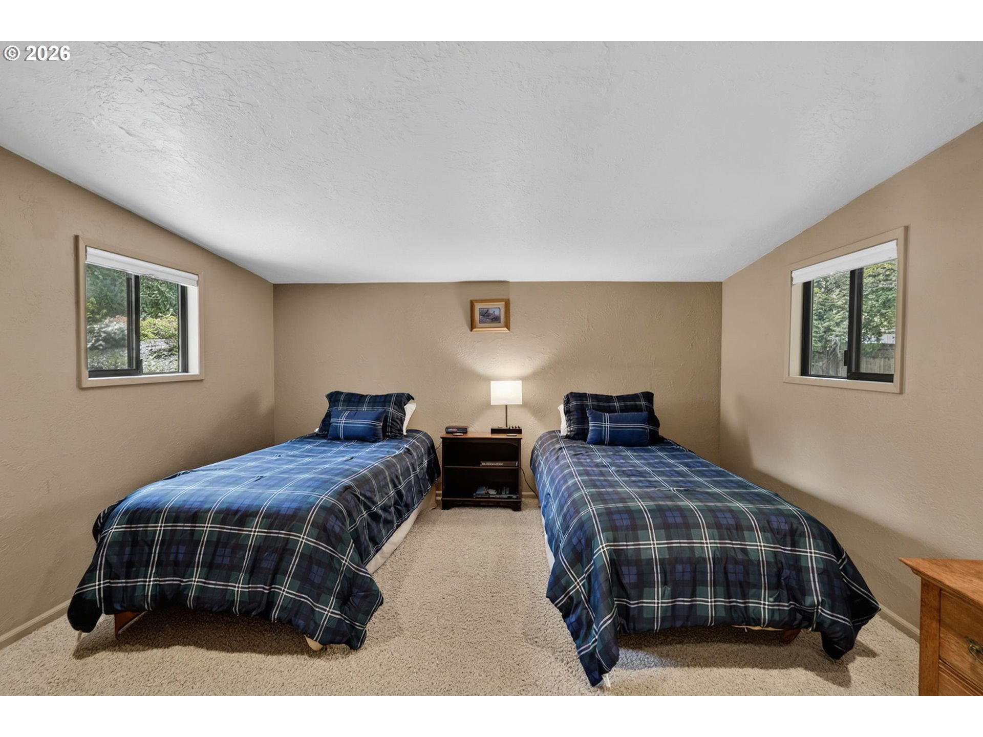 46725 Goodpasture Road Vida, OR 97488 - Photo 13 of 48 a bedroom with two beds and a window