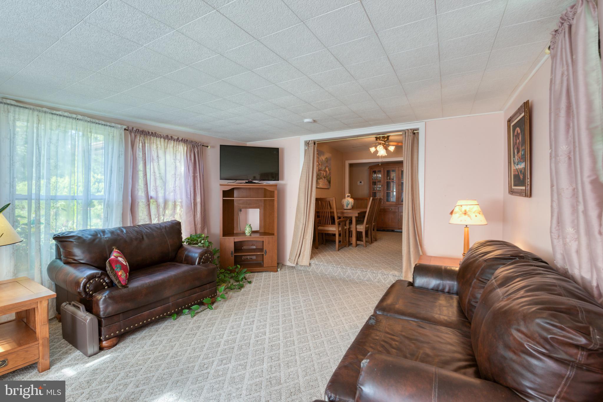 296 Berlin - Cross Keys Road Berlin, NJ 08009 - Photo 15 of 71 a living room with furniture and a couch