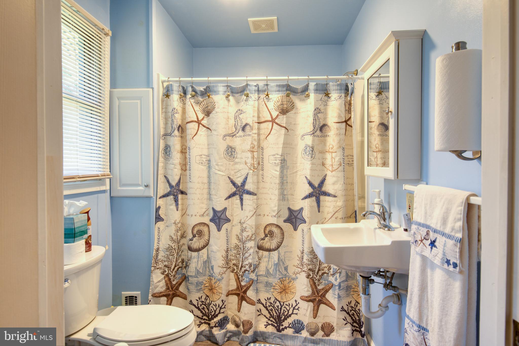 296 Berlin - Cross Keys Road Berlin, NJ 08009 - Photo 24 of 71 a bathroom with a sink toilet and shower