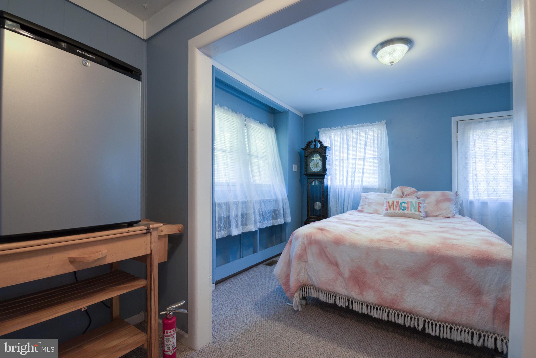 296 Berlin - Cross Keys Road Berlin, NJ 08009 - Photo 29 of 71 a bedroom with a bed and a window