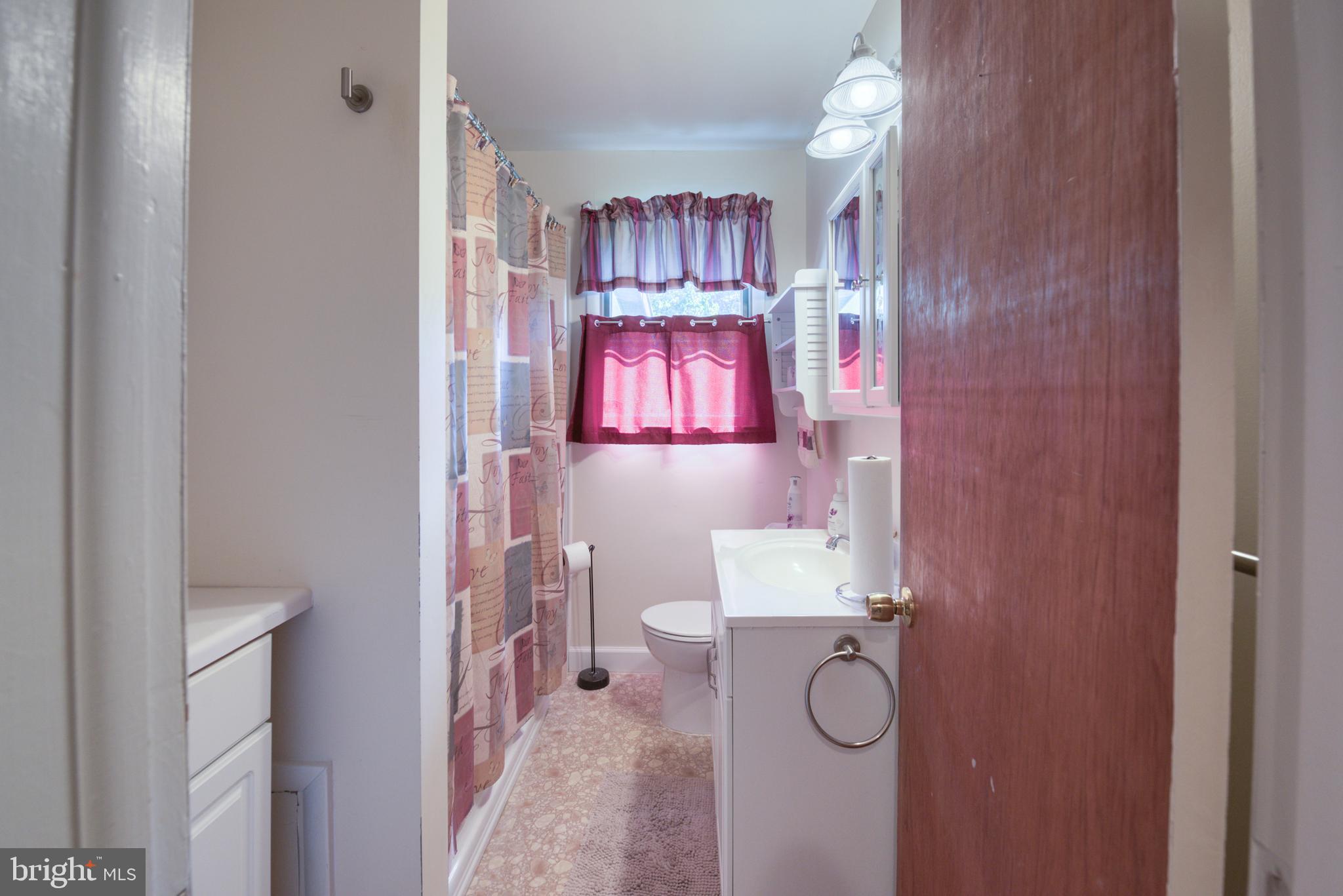 296 Berlin - Cross Keys Road Berlin, NJ 08009 - Photo 35 of 71 a bathroom with a granite countertop toilet and a sink