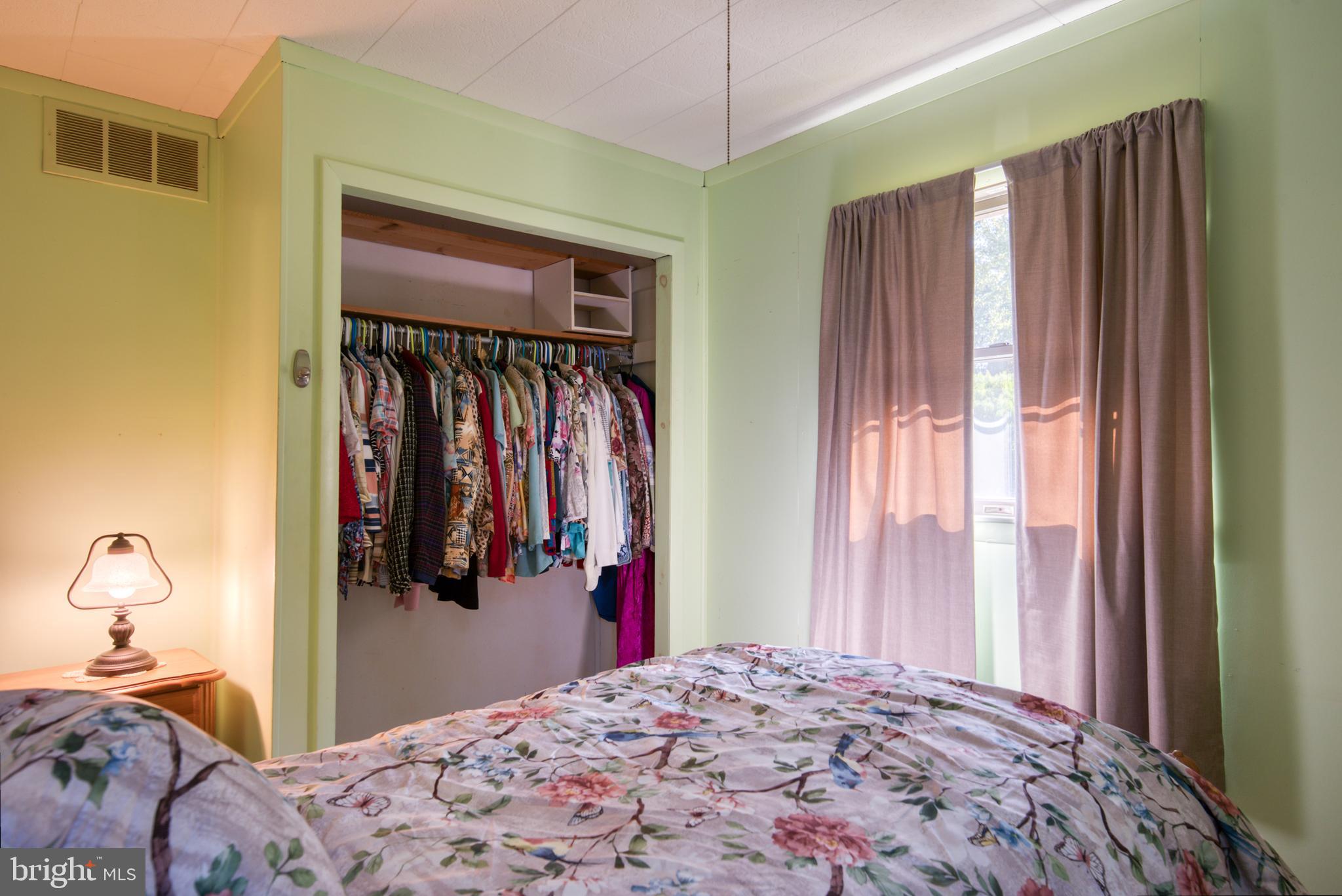 296 Berlin - Cross Keys Road Berlin, NJ 08009 - Photo 37 of 71 a bed room with a bed and a window