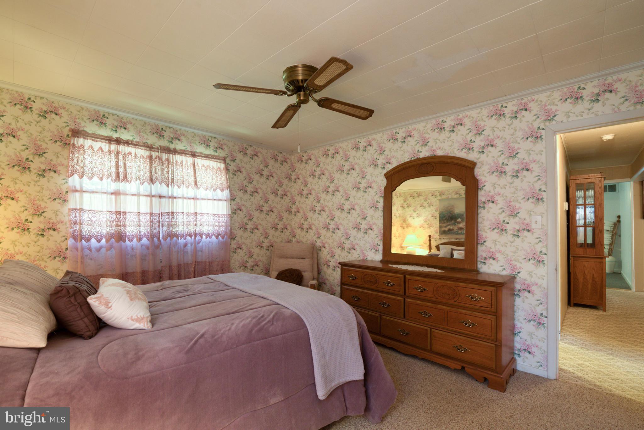 296 Berlin - Cross Keys Road Berlin, NJ 08009 - Photo 42 of 71 a bedroom with a bed and a dresser