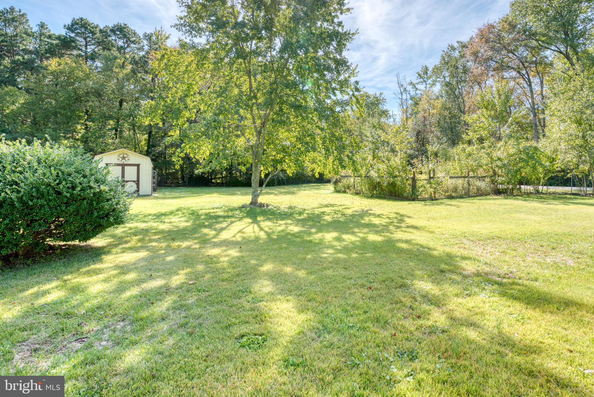296 Berlin - Cross Keys Road Berlin, NJ 08009 - Photo 49 of 71 a backyard of a house with a yard and outdoor seating