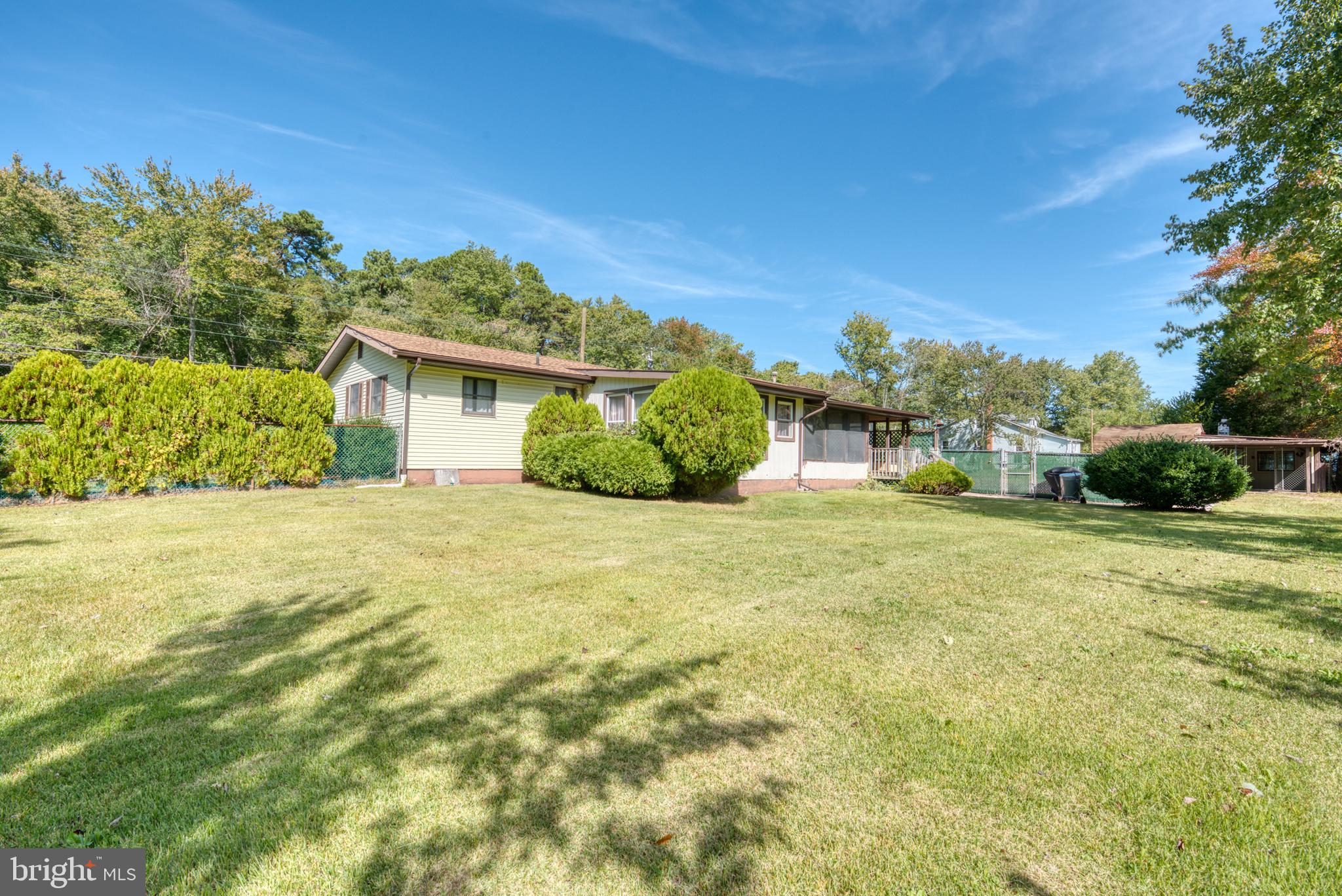 296 Berlin - Cross Keys Road Berlin, NJ 08009 - Photo 62 of 71 a front view of a house with a yard
