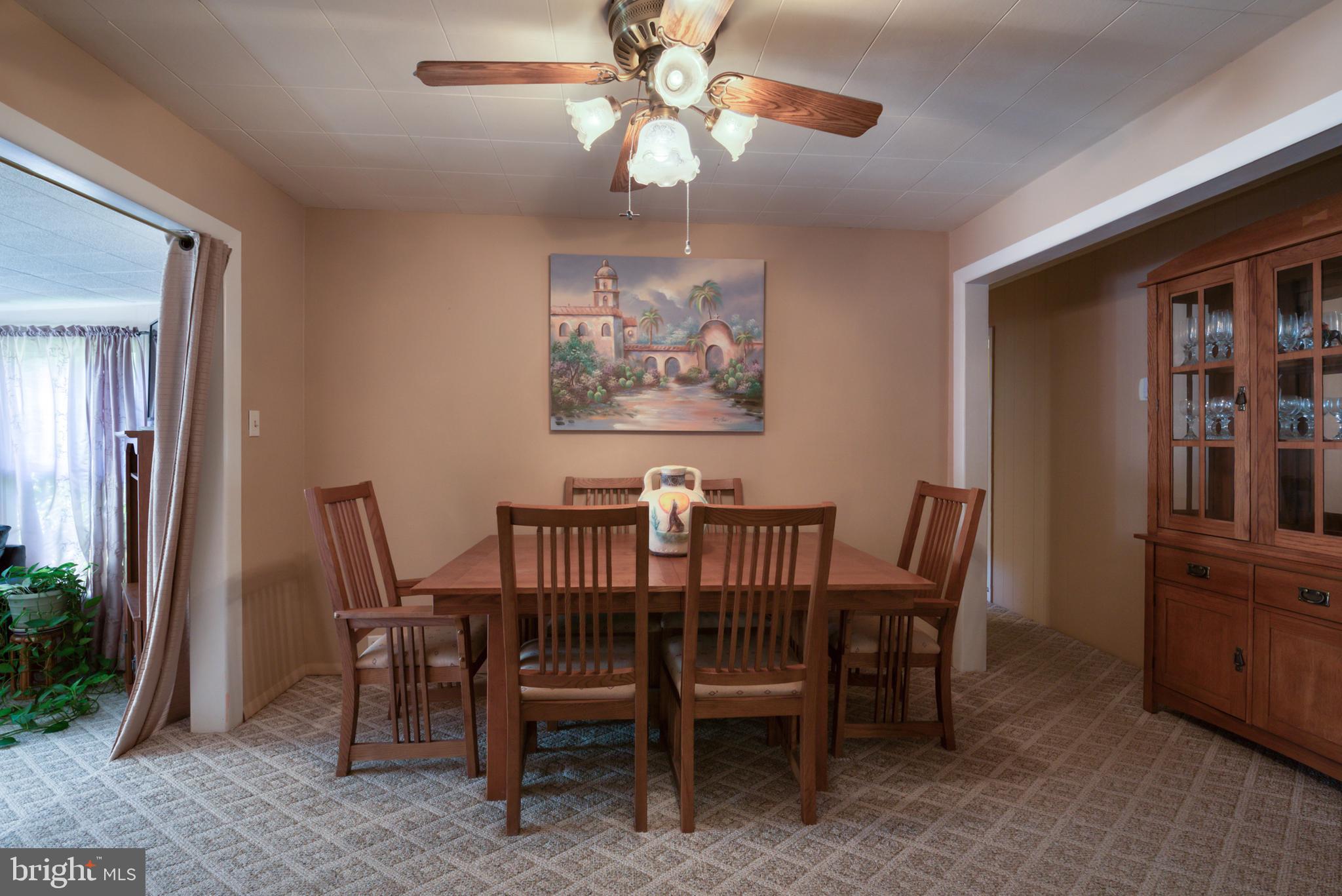 296 Berlin - Cross Keys Road Berlin, NJ 08009 - Photo 9 of 71 a view of a dining room with furniture and chandelier