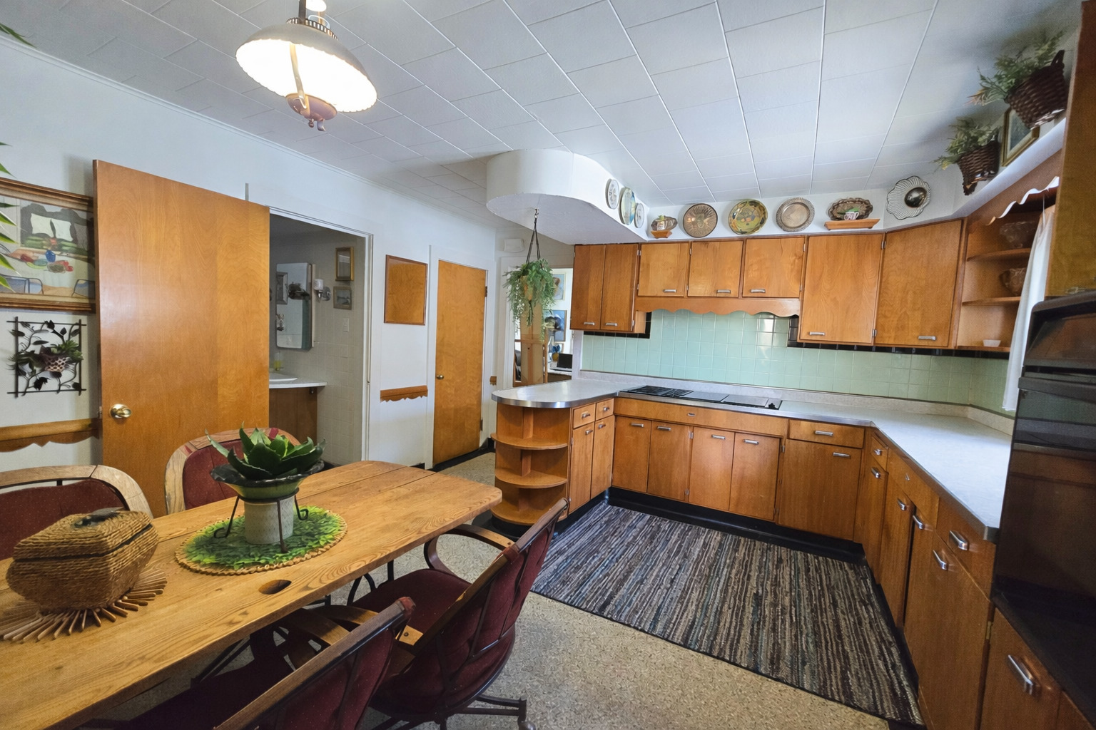 628 3rd Avenue South Clinton, IA 52732 - Photo 13 of 23 a kitchen with stainless steel appliances granite countertop a sink dishwasher stove and cabinets