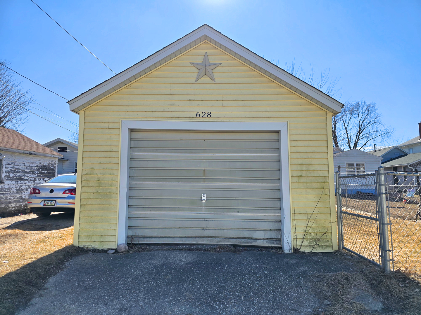 628 3rd Avenue South Clinton, IA 52732 - Photo 22 of 23 a view of garage with parked car