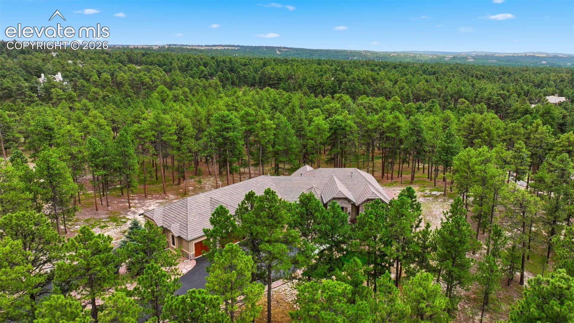 4865 Hidden Rock Road Colorado Springs, CO 80908 - Photo 4 of 50 Your own paradise with second drive to RV garage!