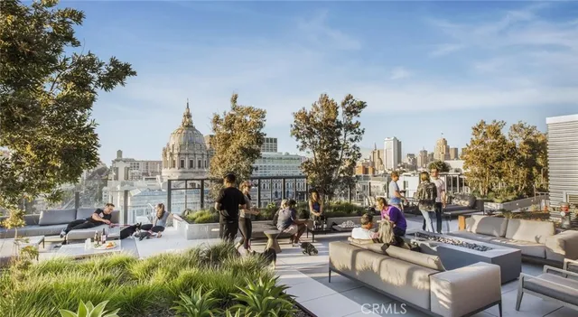 a living room with furniture a rug and a flat screen tv