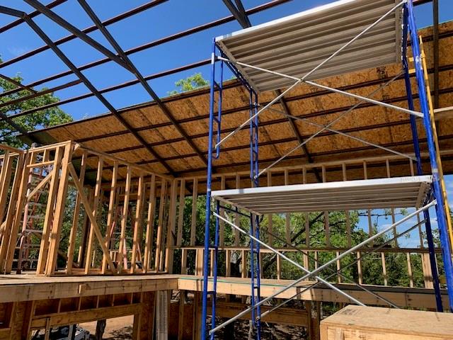 924 The Oil Road Gainesville, TX 76240 - Photo 37 of 39 Erecting Walls and Roof