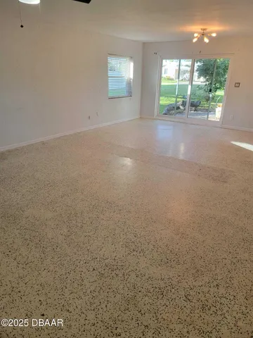 a view of a room with a window