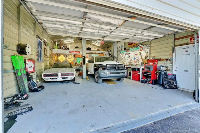a view of parking garage with cars