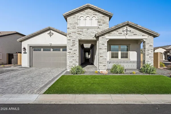 front view of a house with a yard