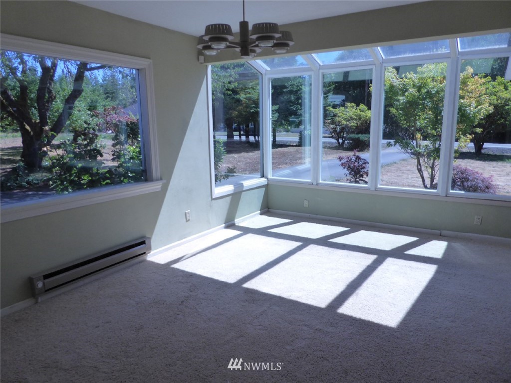 611 Logan Hill Road Chehalis, WA 98532 - Photo 13 of 25 a view of an empty room with a window