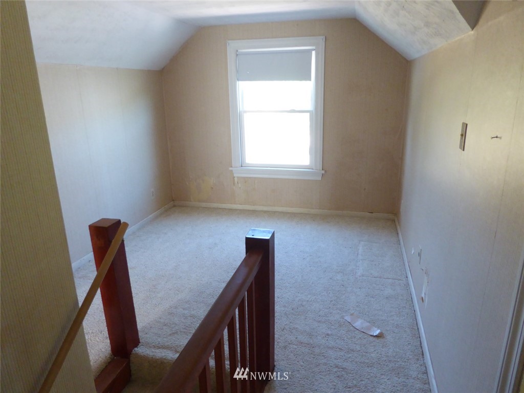 611 Logan Hill Road Chehalis, WA 98532 - Photo 16 of 25 a view of room with window and wooden floor