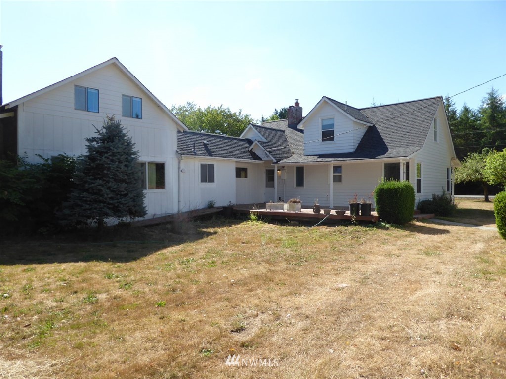 611 Logan Hill Road Chehalis, WA 98532 - Photo 24 of 25 a view of a house with a yard