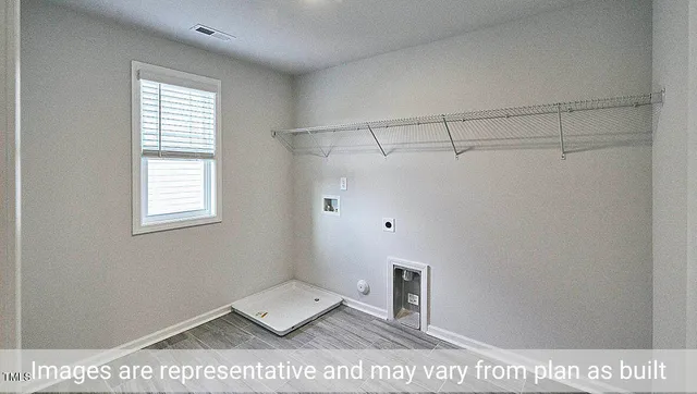 a picture of a bench in front of building