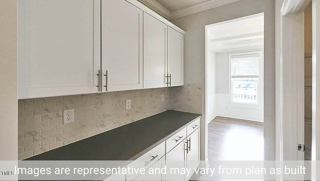 a view of kitchen and microwave