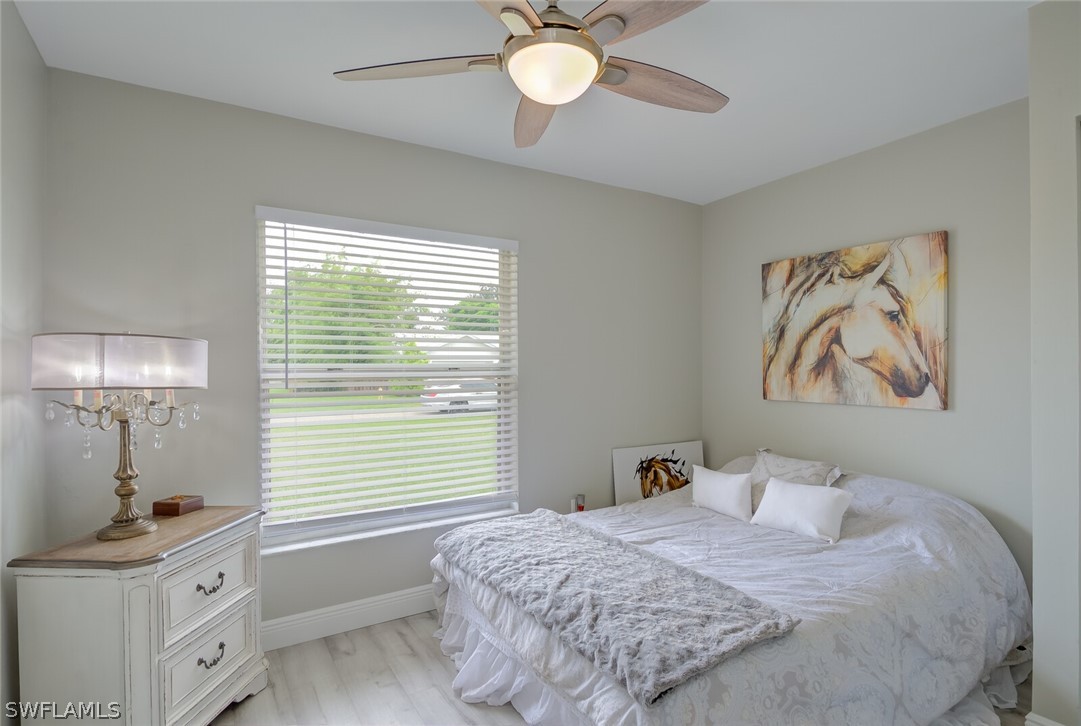 17388 Ingram Road Fort Myers, FL 33967 - Photo 11 of 18 a bedroom with a bed and a window