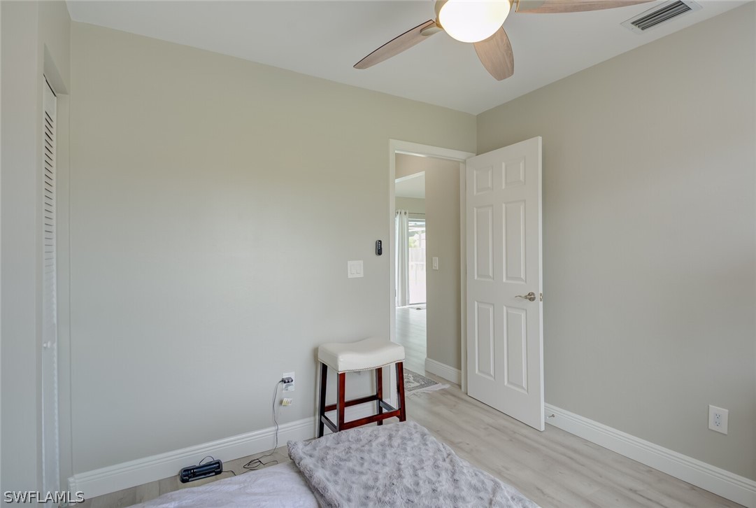 17388 Ingram Road Fort Myers, FL 33967 - Photo 12 of 18 a view of a room with wooden floor and cabinet