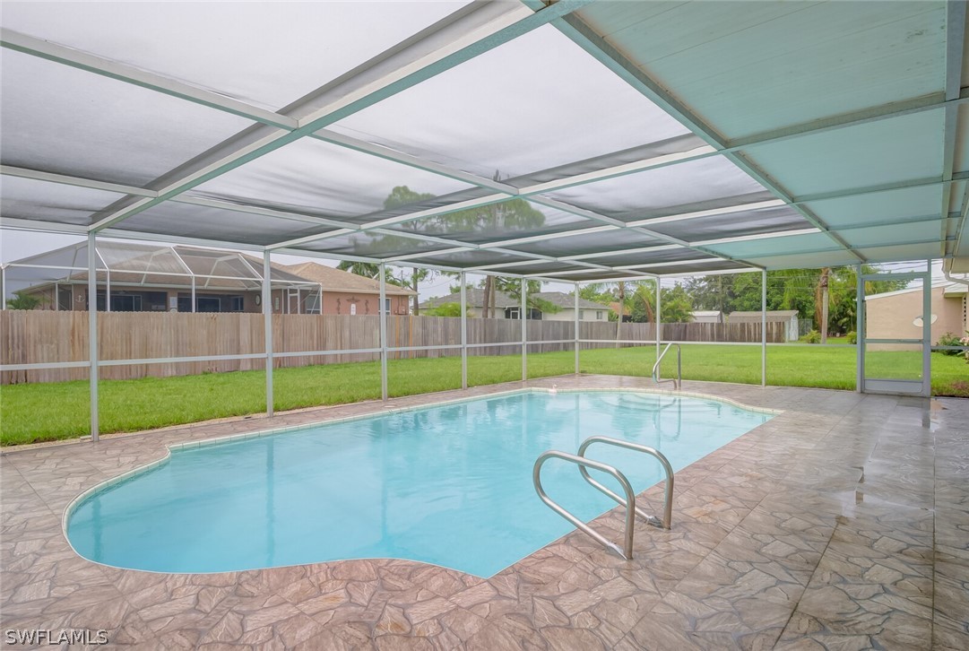 17388 Ingram Road Fort Myers, FL 33967 - Photo 14 of 18 a view of a swimming pool with a backyard