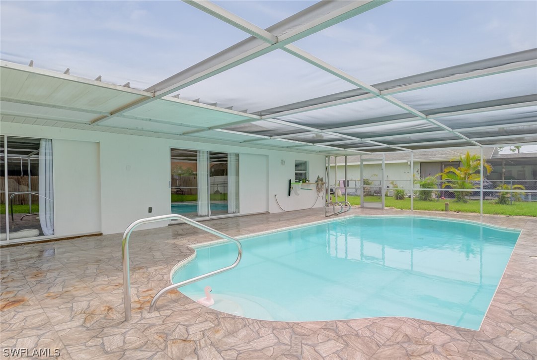 17388 Ingram Road Fort Myers, FL 33967 - Photo 16 of 18 a view of a swimming pool with a patio