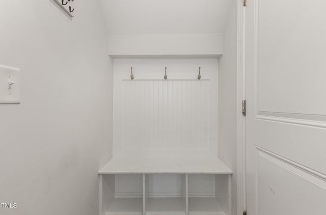 an empty room with a ceiling fan and a ceiling fan