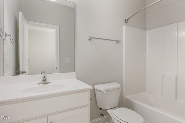 a front view of house with yard and seating area