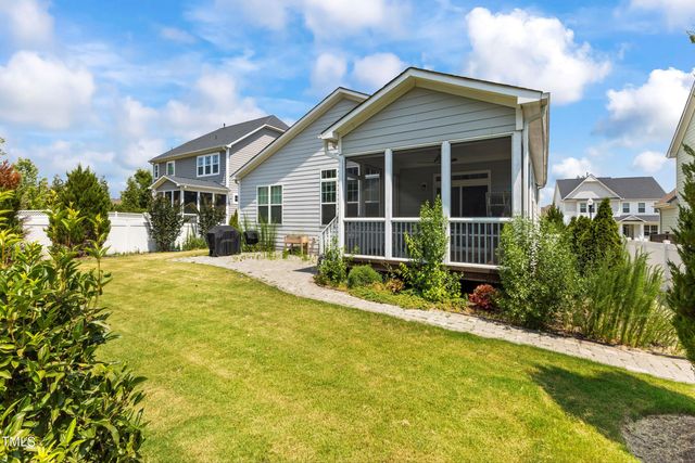 a view of a park with swings and slides