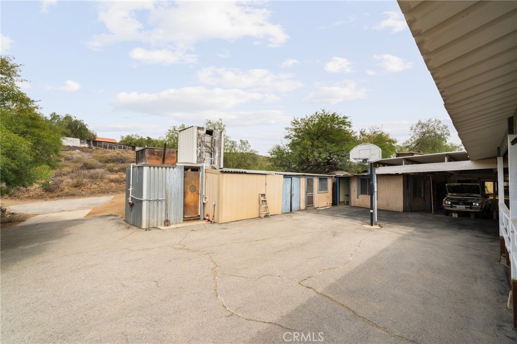 23900 Fellows Way Perris, CA 92570 - Photo 22 of 63 a view of a house with a patio
