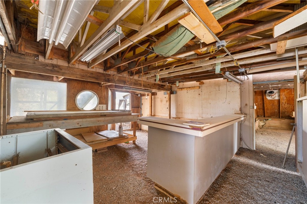 23900 Fellows Way Perris, CA 92570 - Photo 27 of 63 a open kitchen with stainless steel appliances granite countertop a sink stove and cabinets