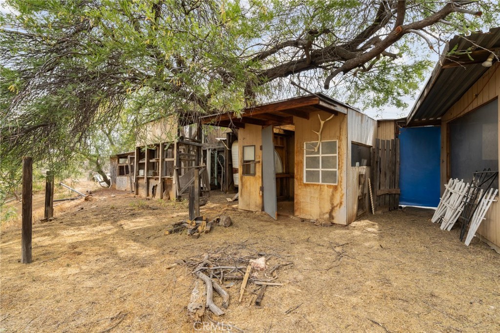 23900 Fellows Way Perris, CA 92570 - Photo 31 of 63 a view of a house with a snow in the yard