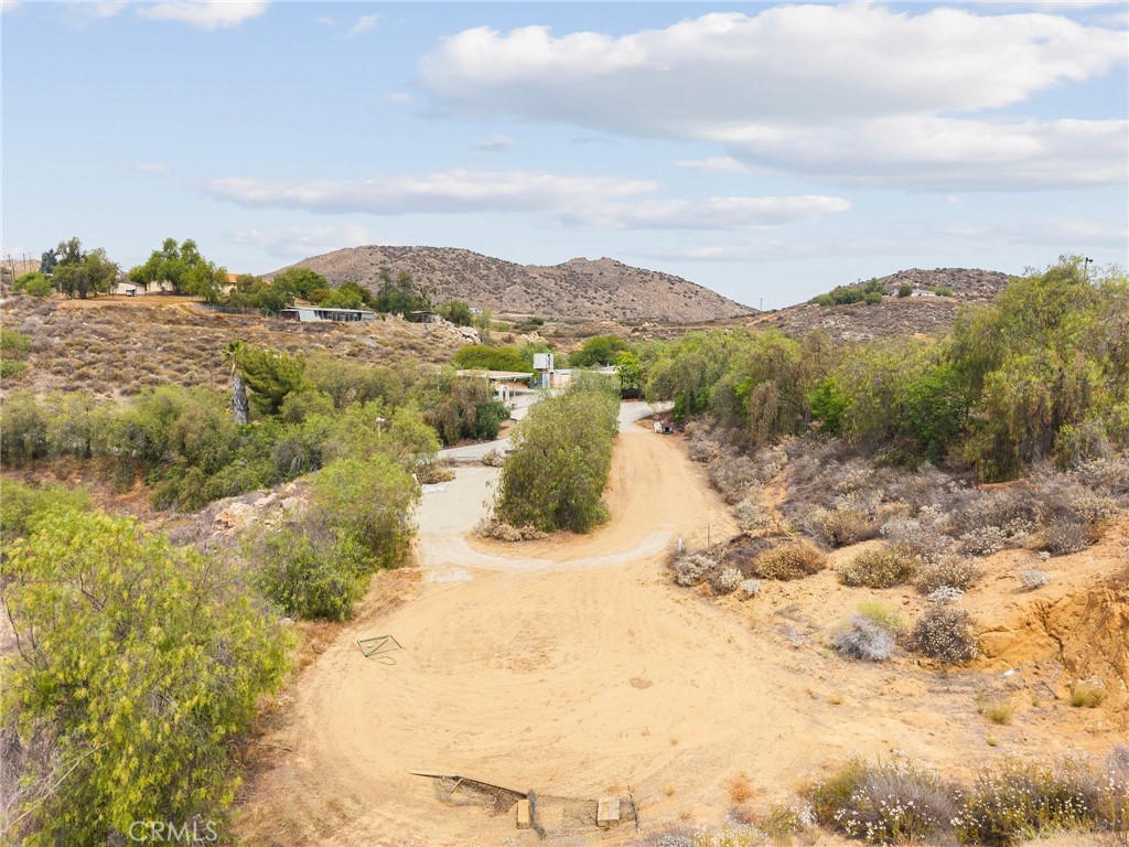 23900 Fellows Way Perris, CA 92570 - Photo 36 of 63 a view of a lake with mountains in the background