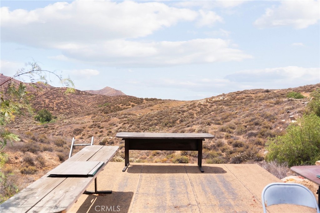 23900 Fellows Way Perris, CA 92570 - Photo 39 of 63 a view of a terrace with a bench