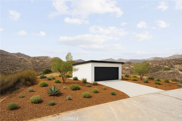 a view of a backyard of the house