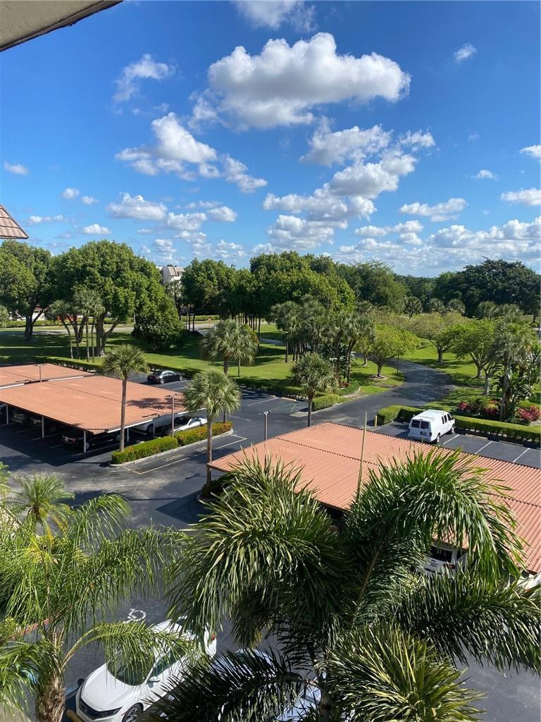 9170 Southwest 14th Street, Unit 4504 Boca Raton, FL 33428 - Photo 14 of 14 View from Front Door and Kitchen