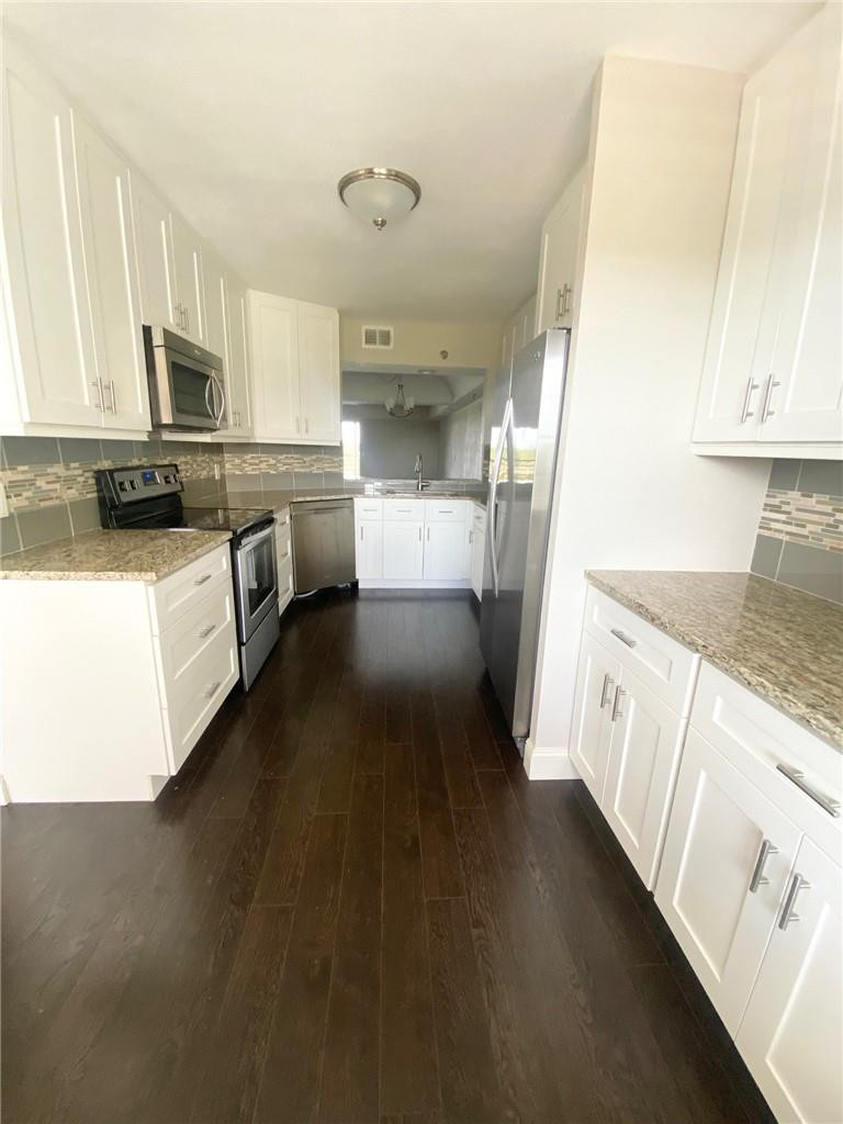 9170 Southwest 14th Street, Unit 4504 Boca Raton, FL 33428 - Photo 2 of 14 Updated and spacious Kitchen with view!