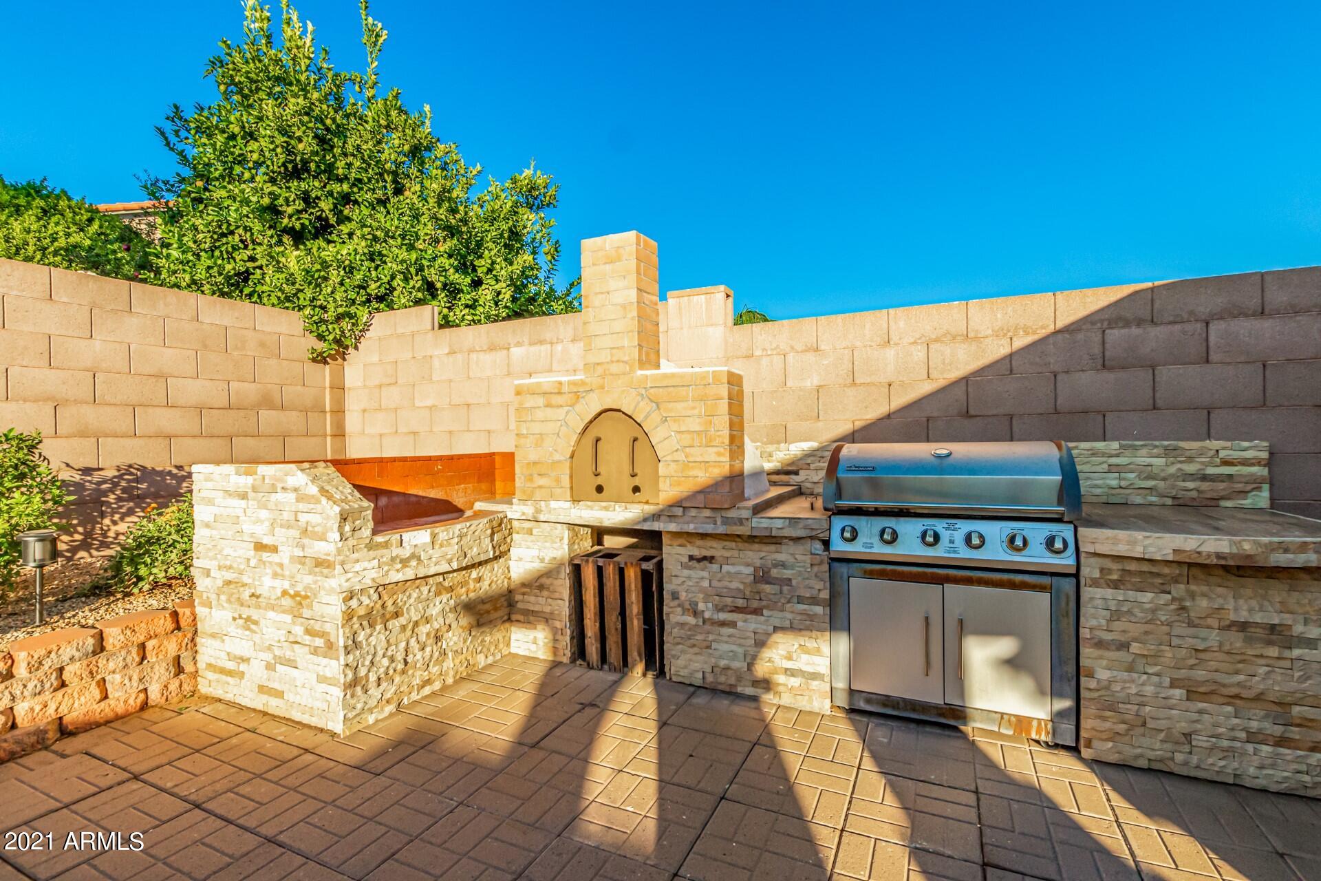 2018 East Wagoner Road Phoenix, AZ 85022 - Photo 21 of 23 BUILT IN BBQ & PIZZA OVEN
