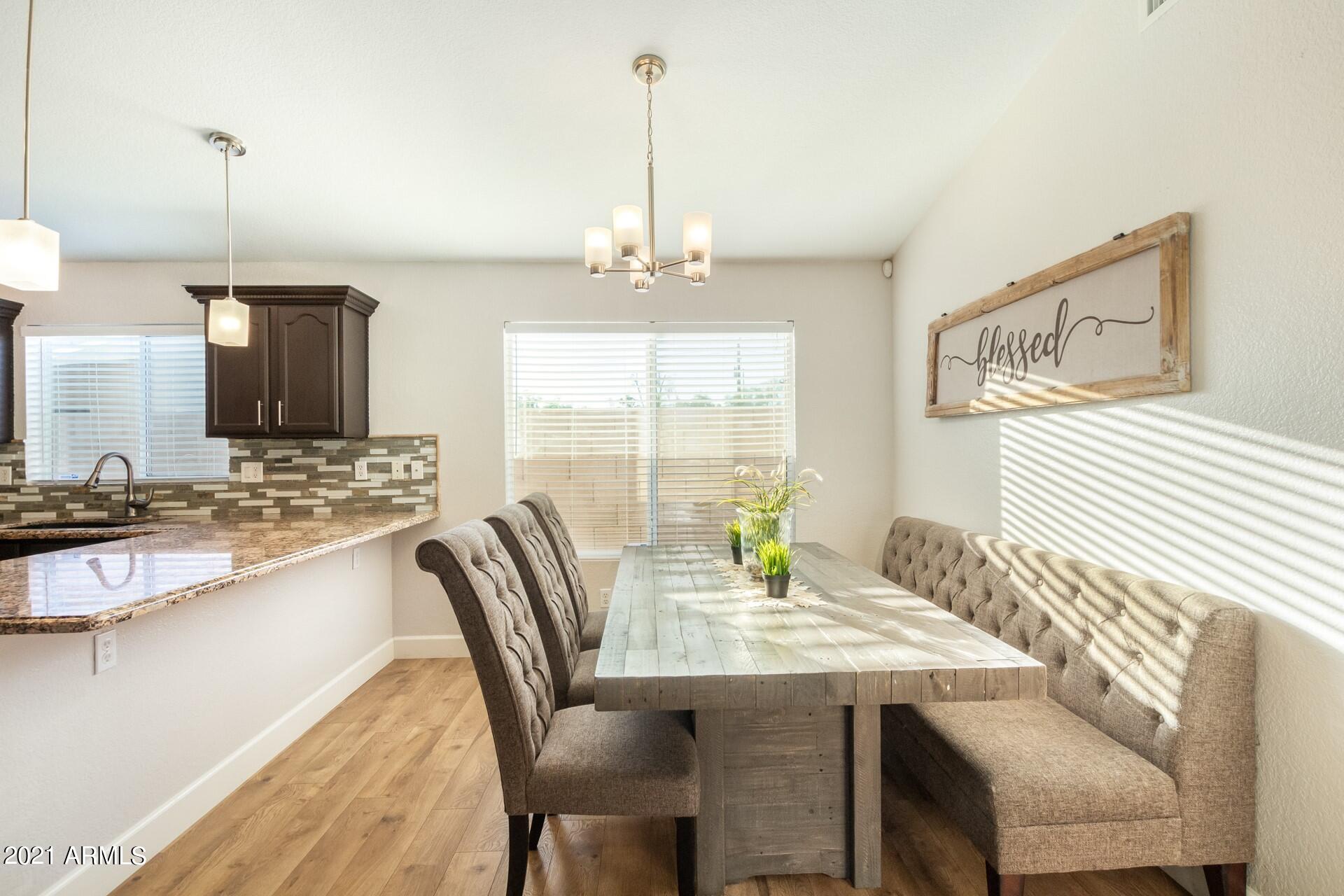 2018 East Wagoner Road Phoenix, AZ 85022 - Photo 7 of 23 DINING ROOM W/ ROOM FOR BARSTOOLS