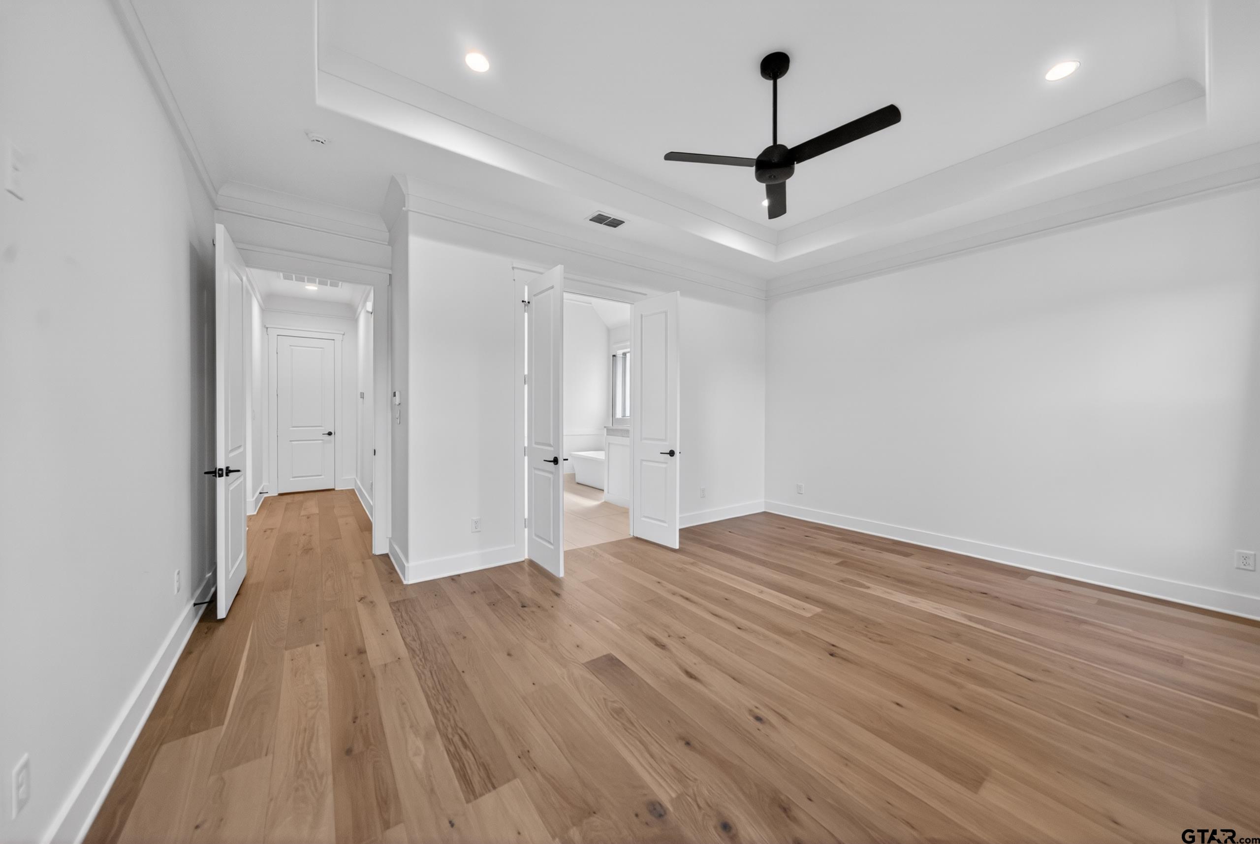 7517 Cross Gate Way Tyler, TX 75703 - Photo 21 of 47 a view of empty room with wooden floor