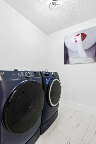 a view of a hallway with entryway to a bedroom