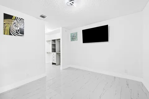 a view of a livingroom with an empty space