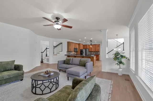 a living room with furniture and a couch